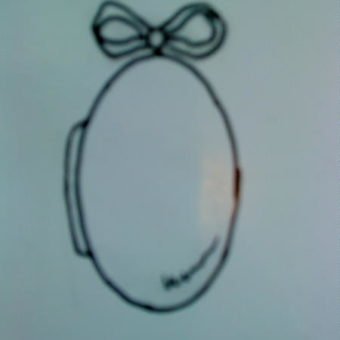 Medaljong i rödguld med rosett i platina samt briljanter och pärlor.