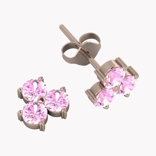 örhängen med rosa stenar