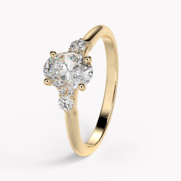 förlovningsring rödguld med oval diamant