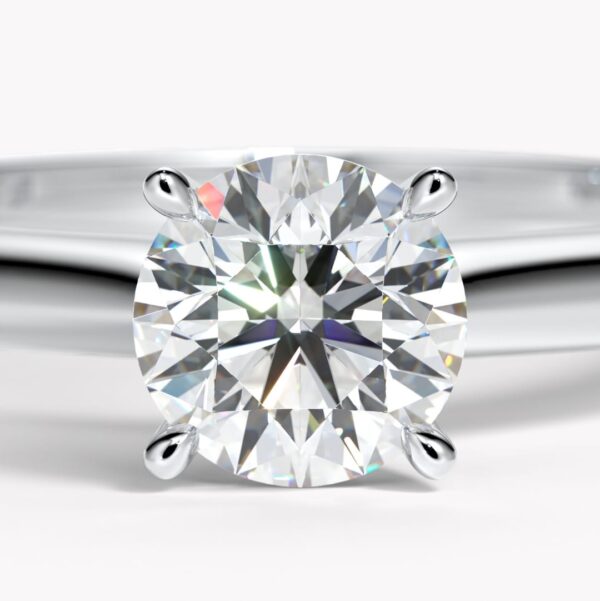 enstensring i platina med briljantslipad diamant